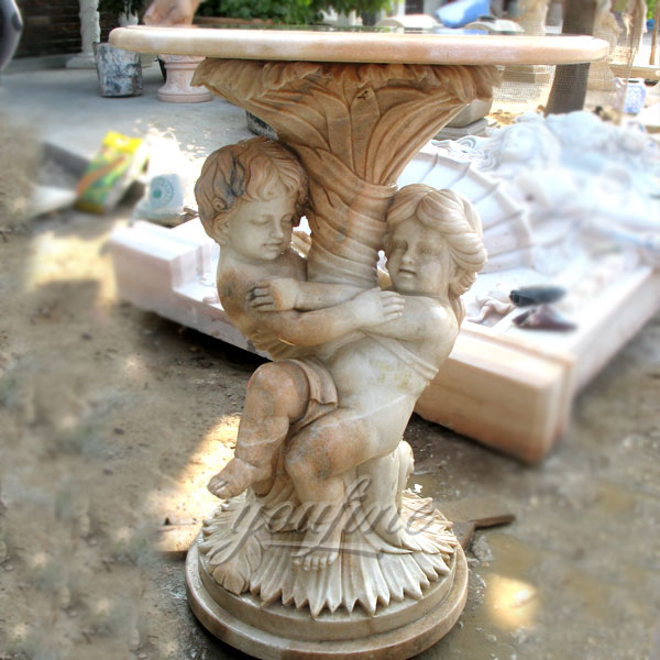 Outdoor beige marble garden table with little children statue in pairs for sale